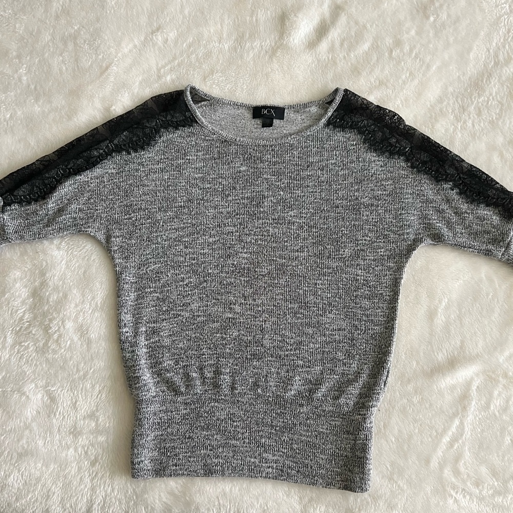 Gray long sleeve with black lace trims.